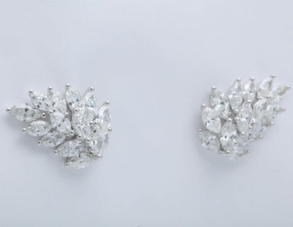 https://a.1stdibscdn.com/diamond-cluster-earring-cuffs-for-sale-picture-3/16156351/j_67519111559204004380/6R1A6032_master.jpg?width=768