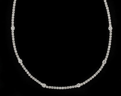 https://a.1stdibscdn.com/diamond-tennis-necklace-for-sale-picture-3/j_415/j_166501421659967982979/6R1A6033_master.jpg?width=768