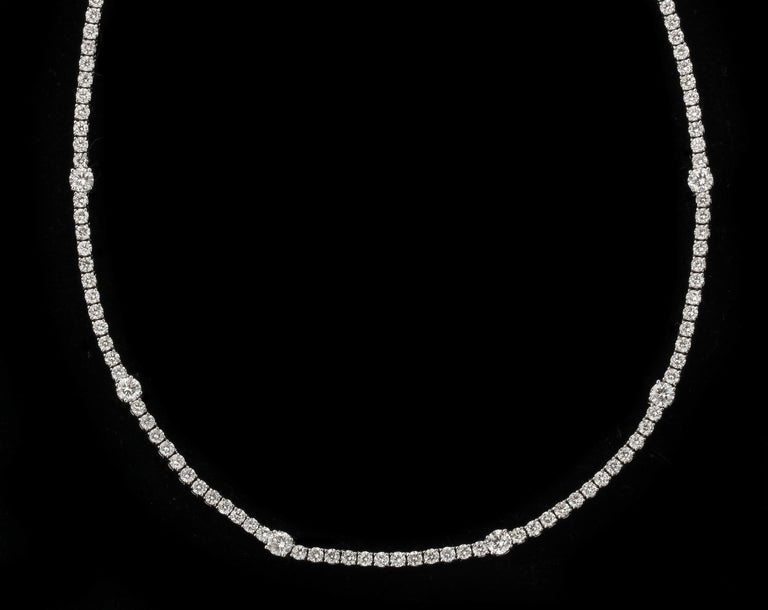 https://a.1stdibscdn.com/diamond-tennis-necklace-for-sale-picture-3/j_415/j_166501421659967982979/6R1A6033_master.jpg?width=768