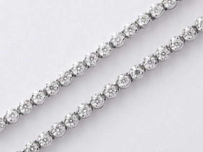 https://a.1stdibscdn.com/long-diamond-tennis-necklace-with-diamond-motifs-for-sale-picture-6/j_415/1565205376248/6R1A6034_master.jpg