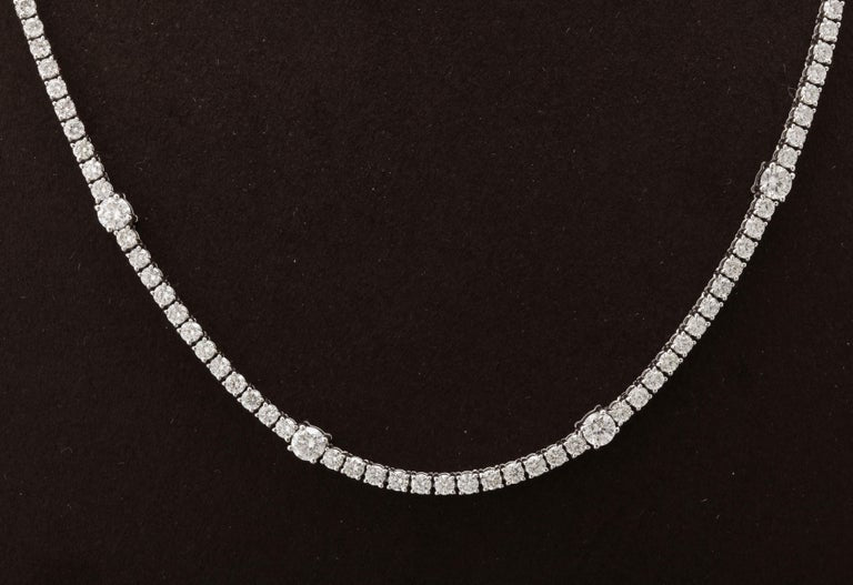 https://a.1stdibscdn.com/diamond-tennis-necklace-for-sale-picture-2/j_415/j_166501421659967985201/6R1A6036_master.jpg?width=768