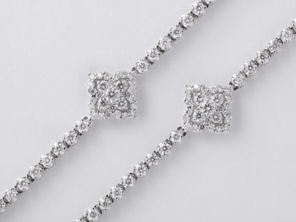 https://a.1stdibscdn.com/long-diamond-tennis-necklace-with-diamond-motifs-for-sale-picture-8/j_415/1565205390809/6R1A6037_master.jpg