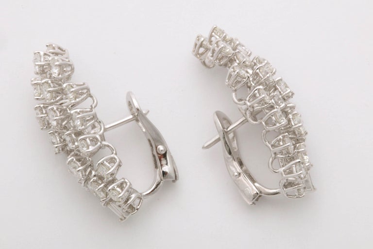 https://a.1stdibscdn.com/diamond-earring-clusters-for-sale-picture-5/0/j_46389731532548072989/6R1A6549_master.jpg?width=768