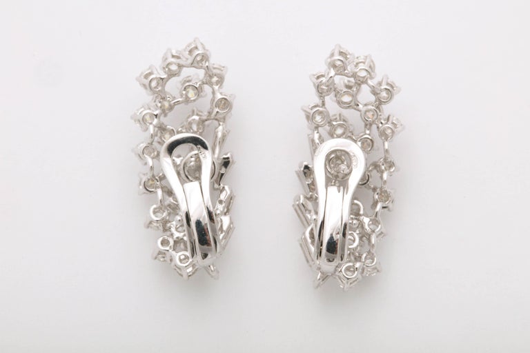 https://a.1stdibscdn.com/diamond-earring-clusters-for-sale-picture-6/0/j_46389731532548074381/6R1A6551_master.jpg?width=768