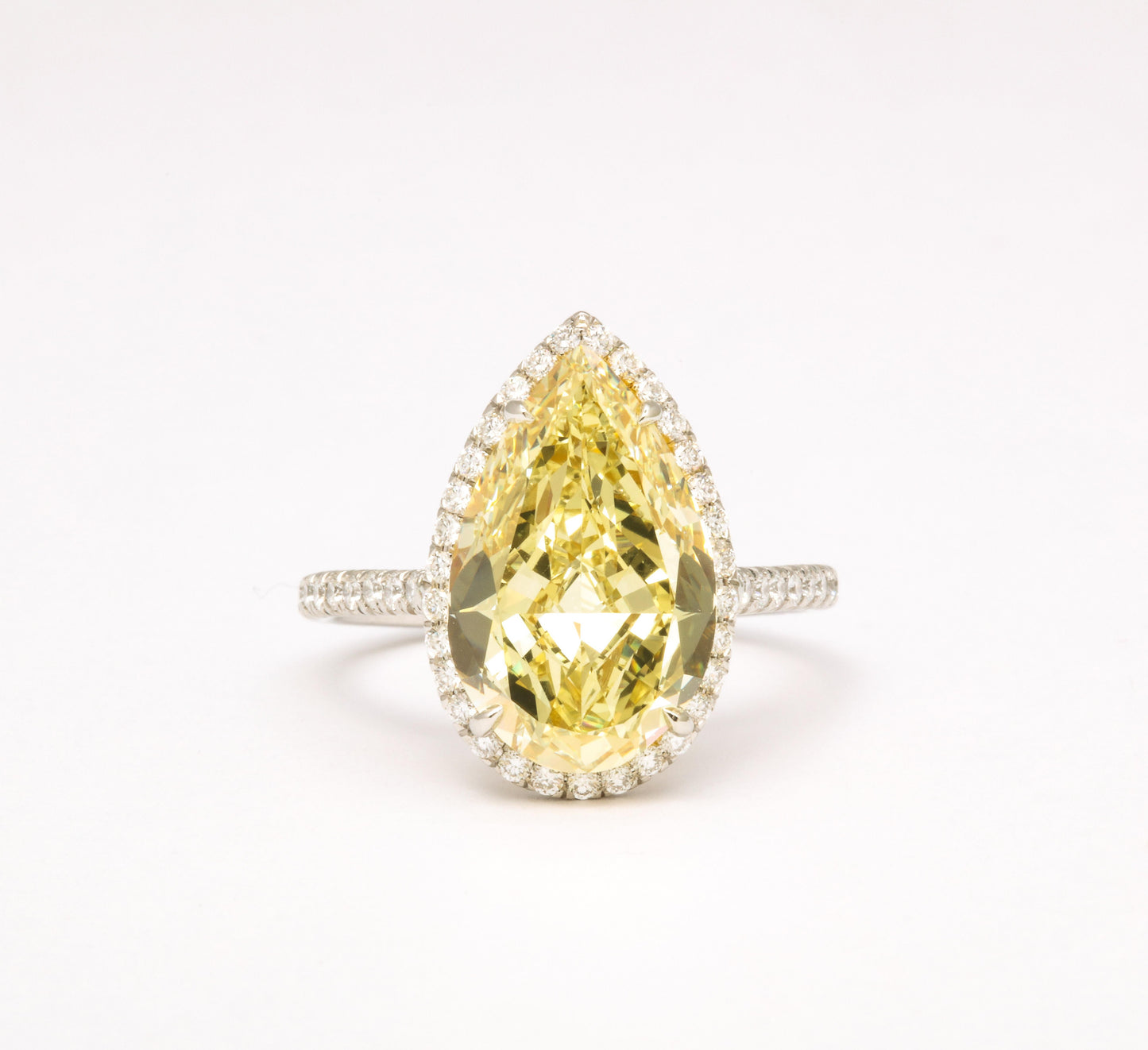 https://a.1stdibscdn.com/5-carat-fancy-yellow-pear-shape-diamond-ring-for-sale-picture-2/j_415/j_154957021650390663227/6R1A6622_master.jpg