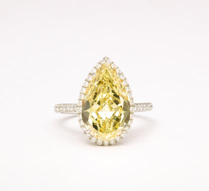 https://a.1stdibscdn.com/5-carat-fancy-yellow-pear-shape-diamond-ring-for-sale-picture-2/j_415/j_154957021650390663227/6R1A6622_master.jpg