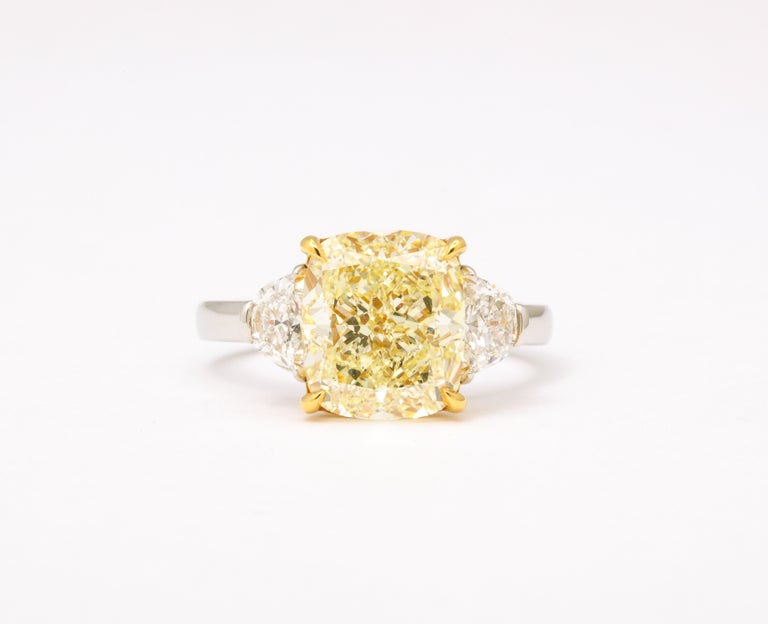 https://a.1stdibscdn.com/5-carat-yellow-diamond-ring-for-sale-picture-2/j_415/j_154958521650391212756/6R1A6658_master.jpg?width=768