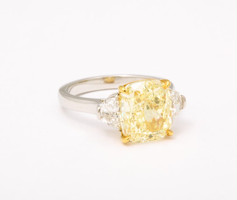 https://a.1stdibscdn.com/5-carat-yellow-diamond-ring-for-sale-picture-3/j_415/j_154958521650391212867/6R1A6659_master.jpg?width=768
