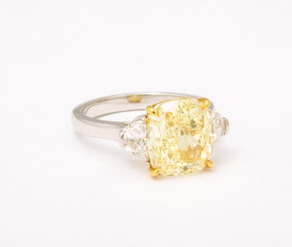 https://a.1stdibscdn.com/5-carat-yellow-diamond-ring-for-sale-picture-3/j_415/j_154958521650391212867/6R1A6659_master.jpg?width=768