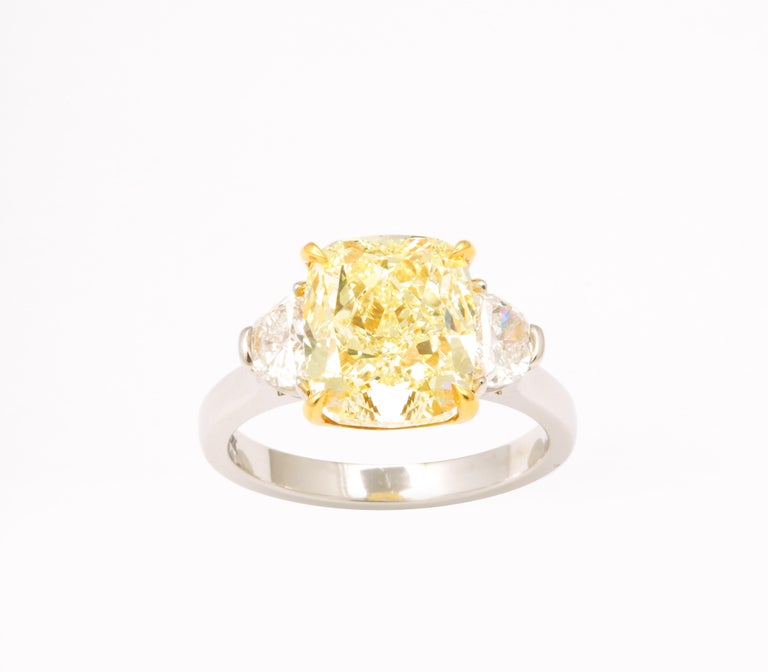 https://a.1stdibscdn.com/5-carat-yellow-diamond-ring-for-sale-picture-9/j_415/j_154958521650391214999/6R1A6666_master.jpg?width=768
