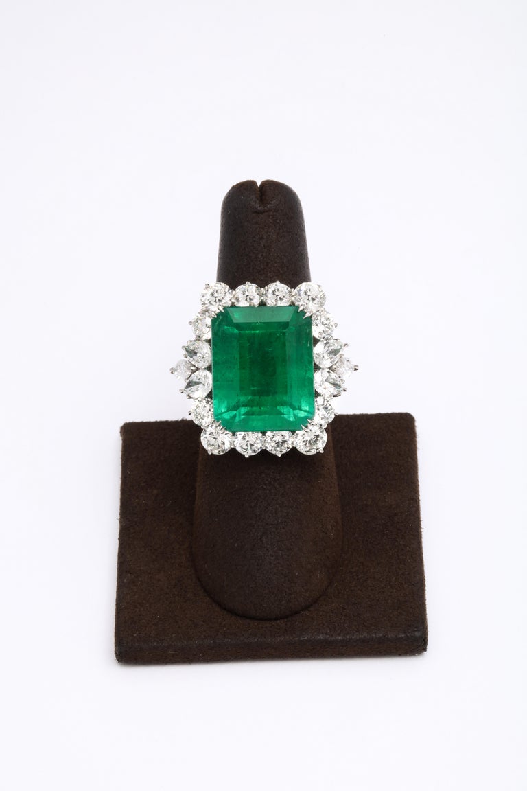 https://a.1stdibscdn.com/emerald-and-diamond-cocktail-ring-for-sale-picture-2/j_415/1612454582635/6R1A6787_master.jpg?width=768