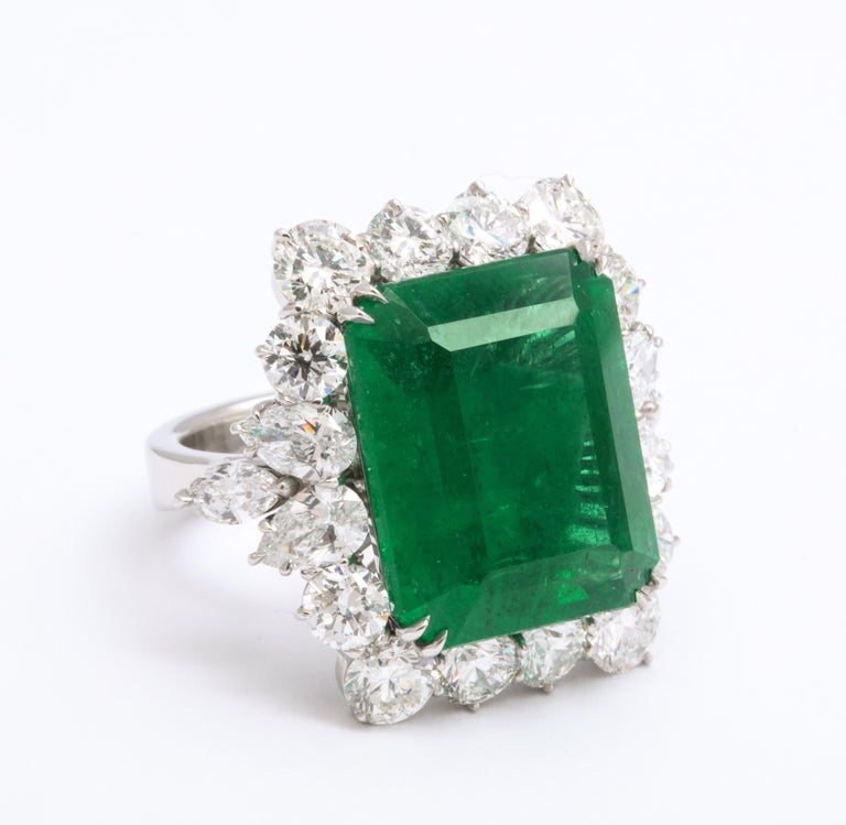 https://a.1stdibscdn.com/emerald-and-diamond-cocktail-ring-for-sale-picture-3/j_415/1612454591133/6R1A6793_master.jpg?width=768