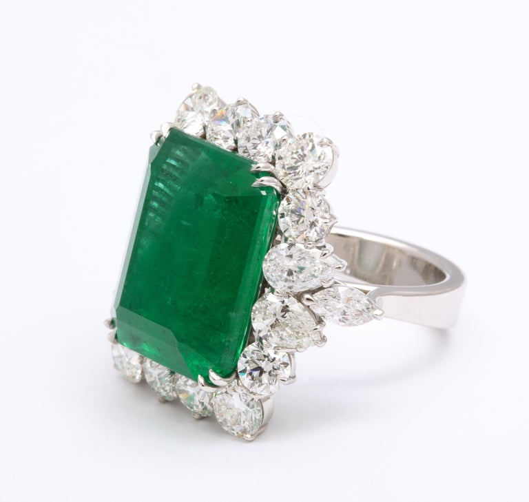 https://a.1stdibscdn.com/emerald-and-diamond-cocktail-ring-for-sale-picture-4/j_415/1612454594866/6R1A6794_master.jpg?width=768