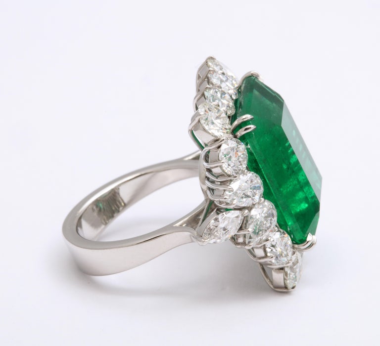 https://a.1stdibscdn.com/emerald-and-diamond-cocktail-ring-for-sale-picture-6/j_415/1612454603498/6R1A6796_master.jpg?width=768