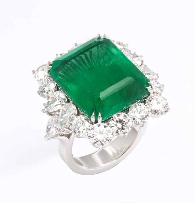 https://a.1stdibscdn.com/emerald-and-diamond-cocktail-ring-for-sale-picture-7/j_415/1612454607225/6R1A6798_master.jpg?width=768