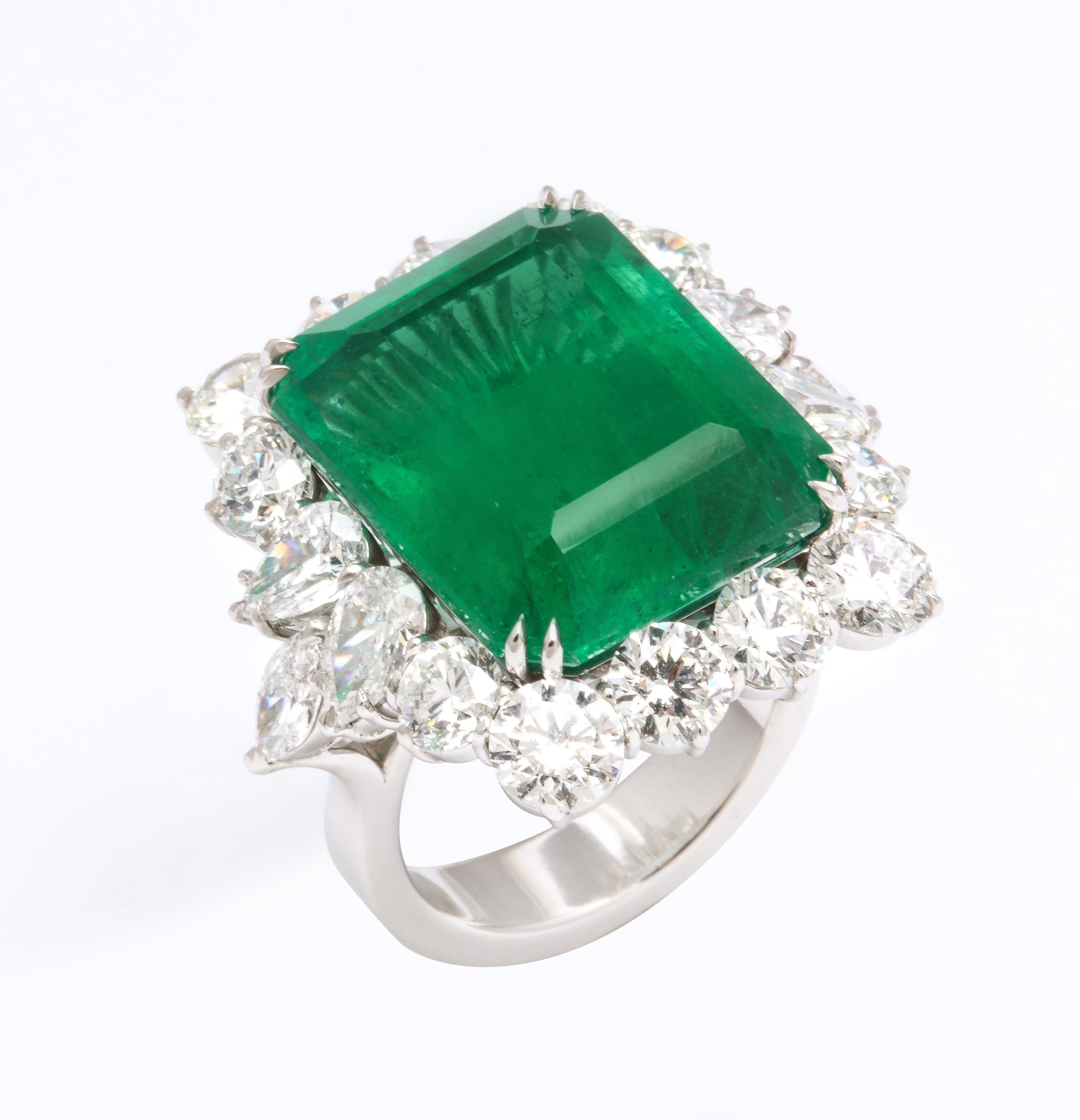https://a.1stdibscdn.com/emerald-and-diamond-cocktail-ring-for-sale-picture-7/j_415/1612454607225/6R1A6798_master.jpg