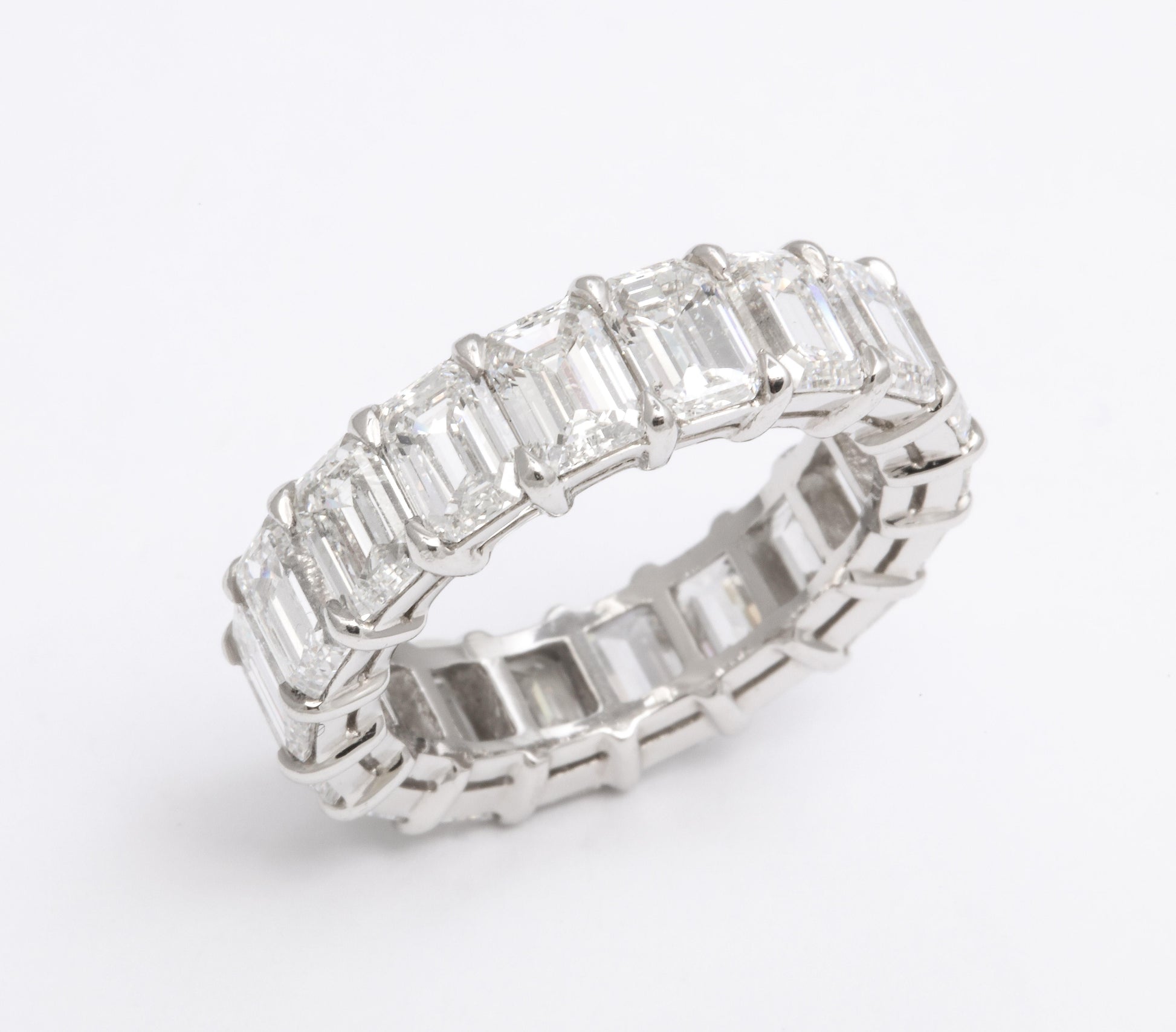 https://a.1stdibscdn.com/9-carat-emerald-cut-diamond-eternity-band-for-sale-picture-2/j_415/1612551597955/6R1A6855_master.jpg