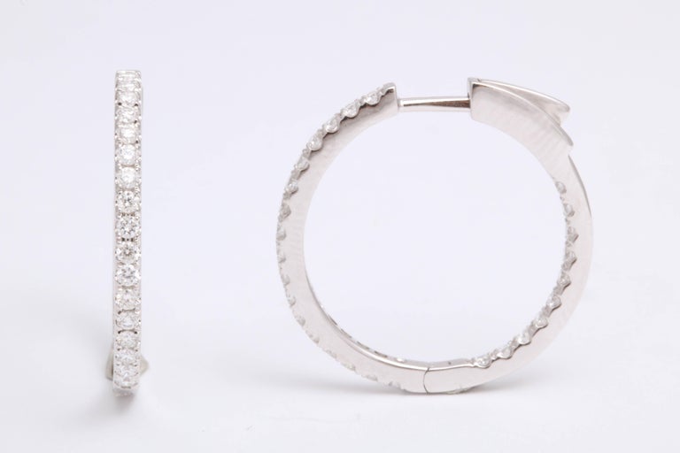 https://a.1stdibscdn.com/diamond-hoop-earrings-for-sale-picture-2/0/j_54005821542818671290/6R1A7007_master.jpg?width=768