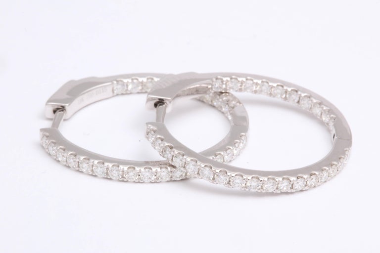 https://a.1stdibscdn.com/diamond-hoop-earrings-for-sale-picture-4/0/j_54005821542818672584/6R1A7009_master.jpg?width=768
