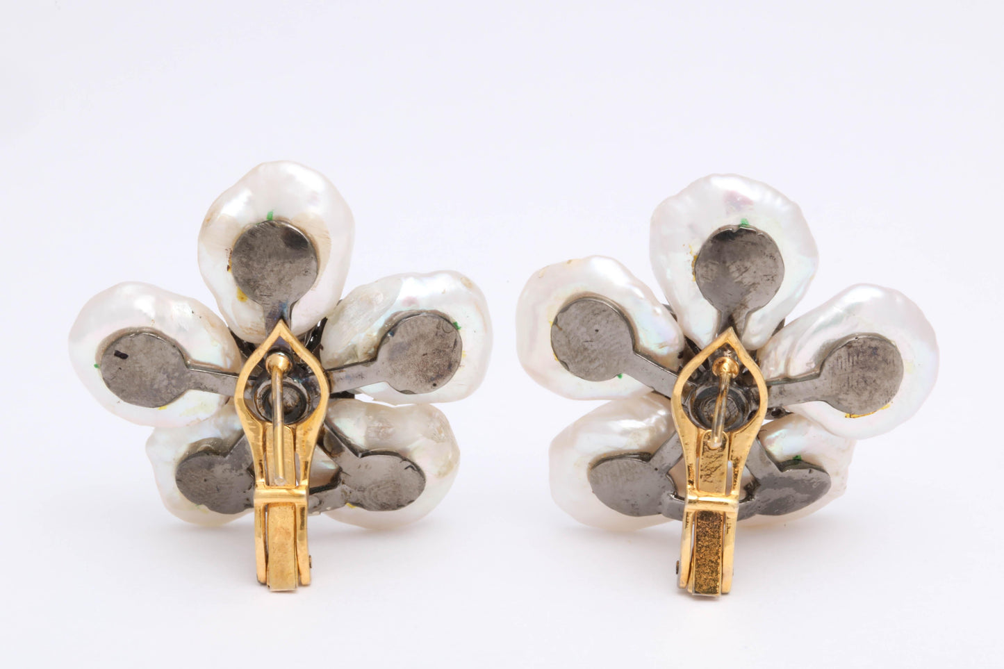https://a.1stdibscdn.com/pearl-leaf-and-diamond-flower-earring-for-sale-picture-5/j_415/j_130060421628558032950/6R1A7168_master.jpg