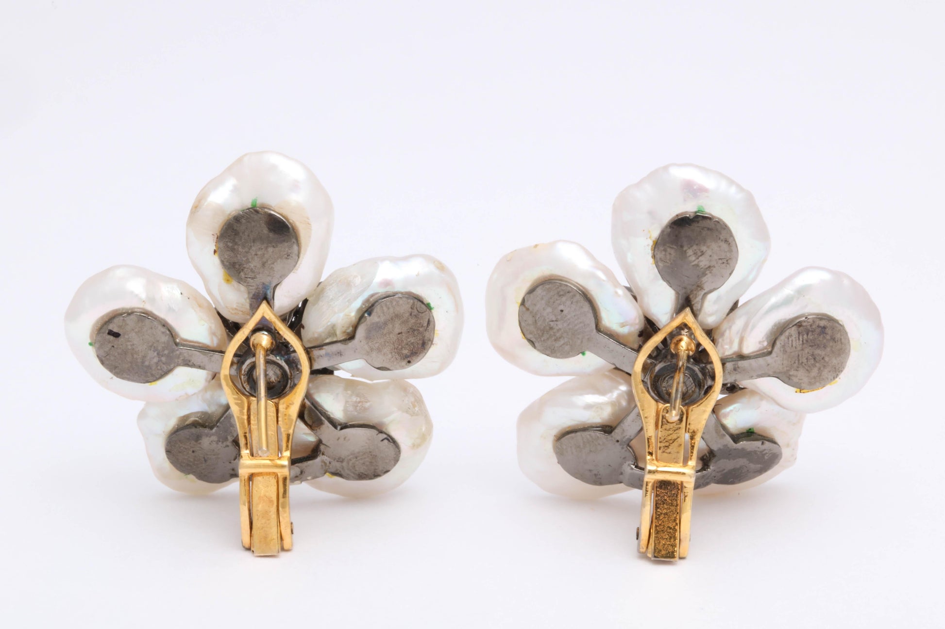 https://a.1stdibscdn.com/pearl-leaf-and-diamond-flower-earring-for-sale-picture-5/j_415/j_130060421628558032950/6R1A7168_master.jpg