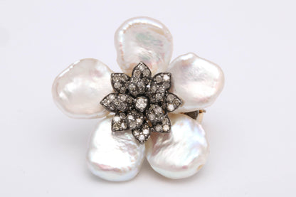 https://a.1stdibscdn.com/pearl-leaf-and-diamond-flower-earring-for-sale-picture-6/j_415/j_130060421628558033333/6R1A7169_master.jpg