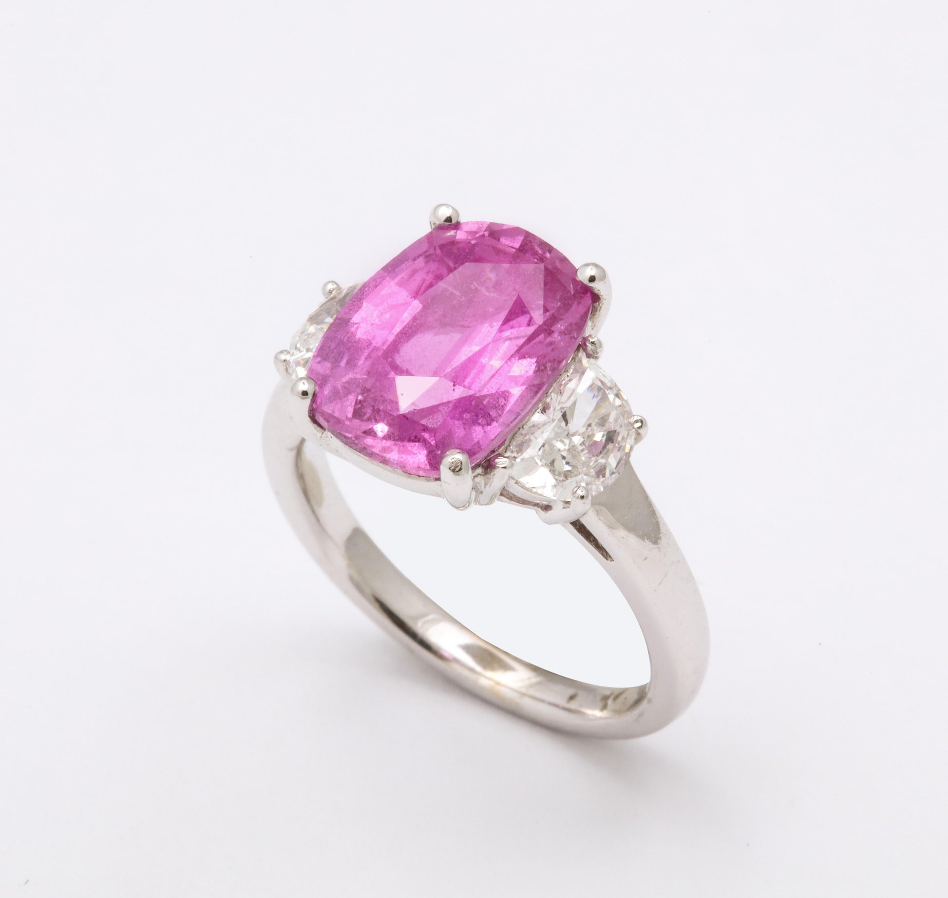 https://a.1stdibscdn.com/5-carat-pink-sapphire-and-diamond-ring-for-sale-picture-5/j_415/1607532273883/6R1A7309_master.jpg