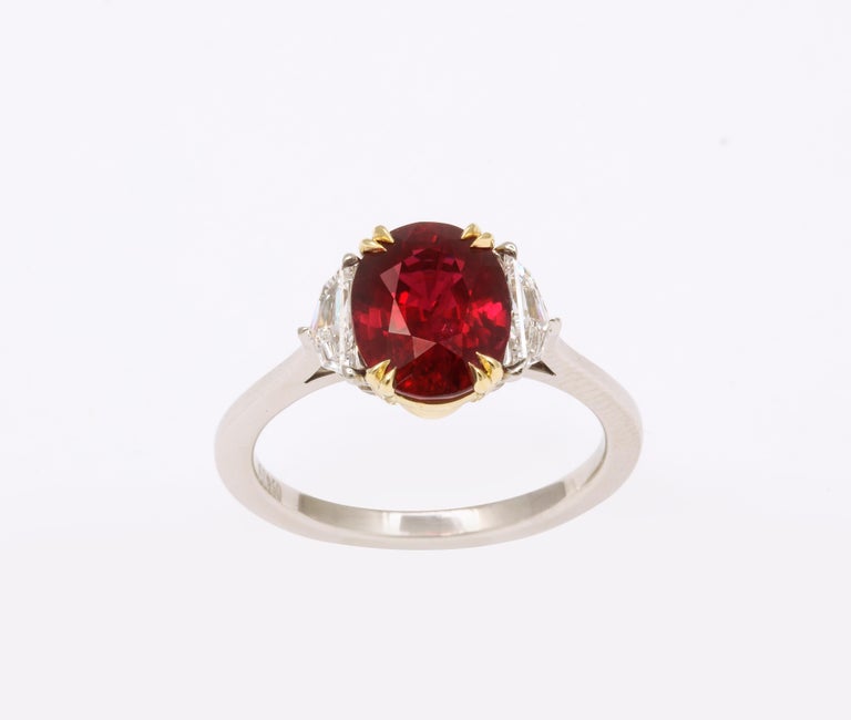 https://a.1stdibscdn.com/vivid-red-ruby-and-diamond-ring-for-sale-picture-3/j_415/j_143152421640712145579/6R1A8282_master.jpg?width=768