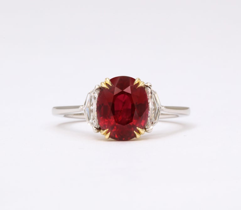 https://a.1stdibscdn.com/vivid-red-ruby-and-diamond-ring-for-sale-picture-5/j_415/j_143152421640712146201/6R1A8286_master.jpg?width=768