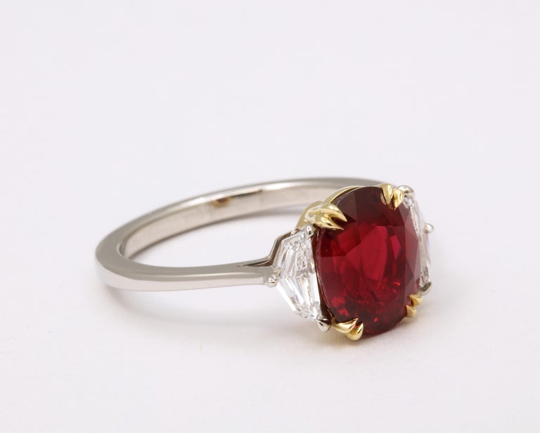 https://a.1stdibscdn.com/vivid-red-ruby-and-diamond-ring-for-sale-picture-6/j_415/j_143152421640712146204/6R1A8287_master.jpg?width=768