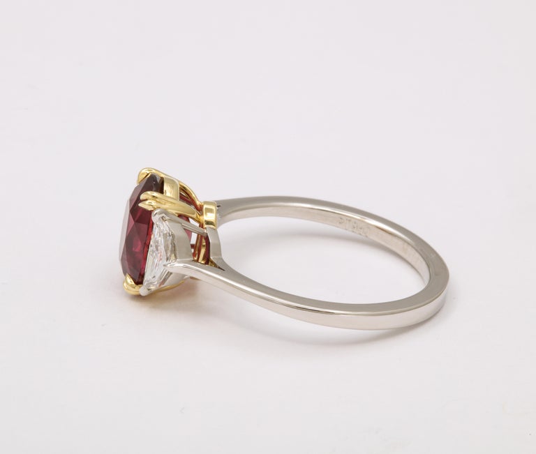 https://a.1stdibscdn.com/vivid-red-ruby-and-diamond-ring-for-sale-picture-9/j_415/j_143152421640712149163/6R1A8292_master.jpg?width=768