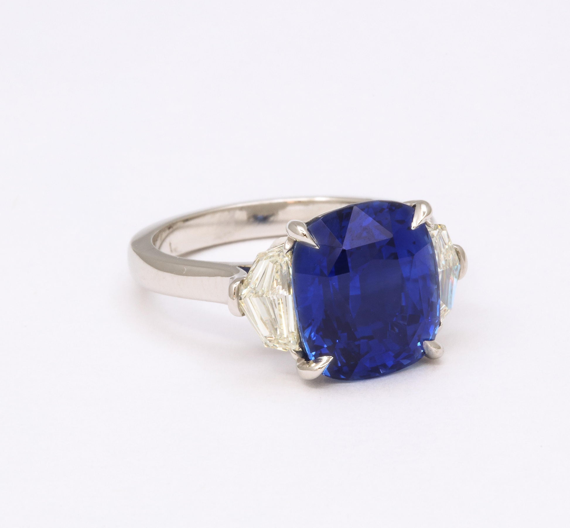 https://a.1stdibscdn.com/7-carat-cushion-cut-sapphire-and-diamond-ring-for-sale-picture-5/j_415/j_144397121641926939415/6R1A8304_master.jpg
