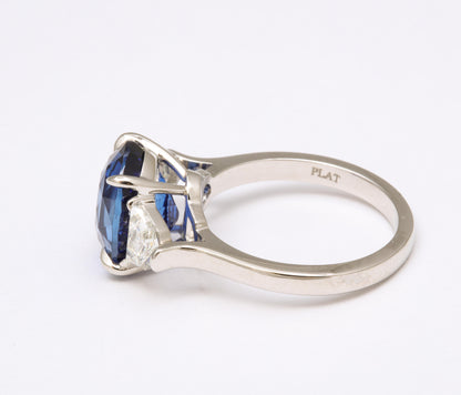 https://a.1stdibscdn.com/6-carat-oval-blue-sapphire-and-diamond-ring-for-sale-picture-6/j_415/j_144397421641927204233/6R1A8330_master.jpg