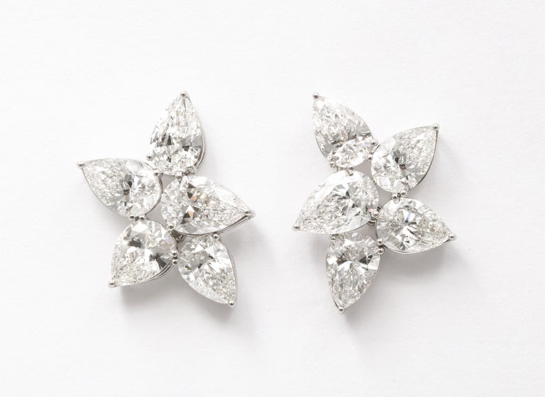https://a.1stdibscdn.com/diamond-cluster-earrings-for-sale-picture-2/j_415/j_145871221643387926545/6R1A8358_master.jpg?width=768