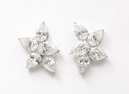 https://a.1stdibscdn.com/diamond-cluster-earrings-for-sale-picture-2/j_415/j_145871221643387926545/6R1A8358_master.jpg?width=768