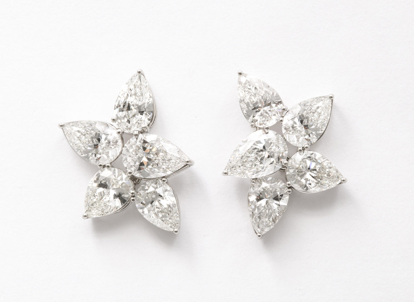https://a.1stdibscdn.com/diamond-cluster-earrings-for-sale-picture-2/j_415/j_145871221643387926545/6R1A8358_master.jpg