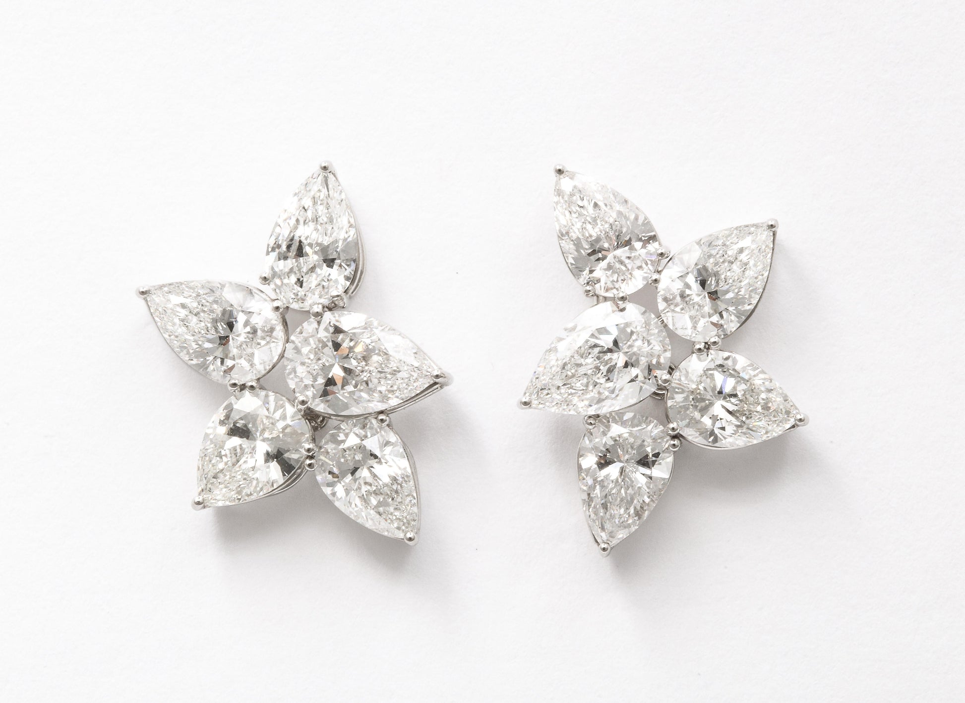https://a.1stdibscdn.com/diamond-cluster-earrings-for-sale-picture-2/j_415/j_145871221643387926545/6R1A8358_master.jpg