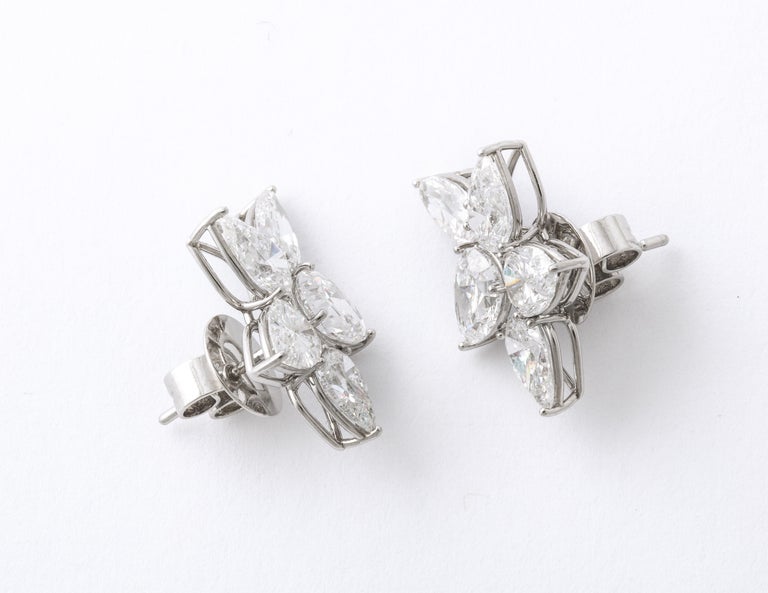 https://a.1stdibscdn.com/diamond-cluster-earrings-for-sale-picture-5/j_415/j_145871221643387926643/6R1A8364_master.jpg?width=768