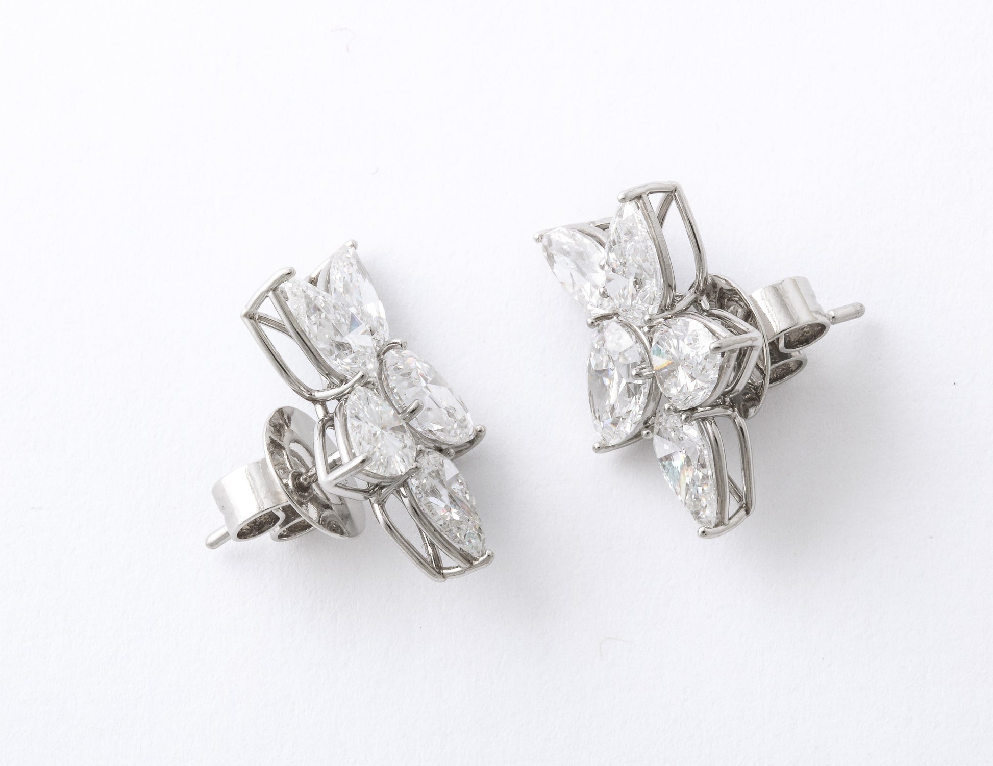 https://a.1stdibscdn.com/diamond-cluster-earrings-for-sale-picture-5/j_415/j_145871221643387926643/6R1A8364_master.jpg