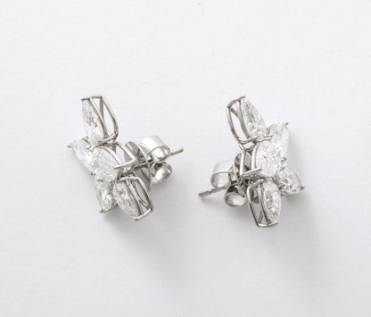 https://a.1stdibscdn.com/diamond-cluster-earrings-for-sale-picture-6/j_415/j_145871221643387926804/6R1A8366_master.jpg?width=768
