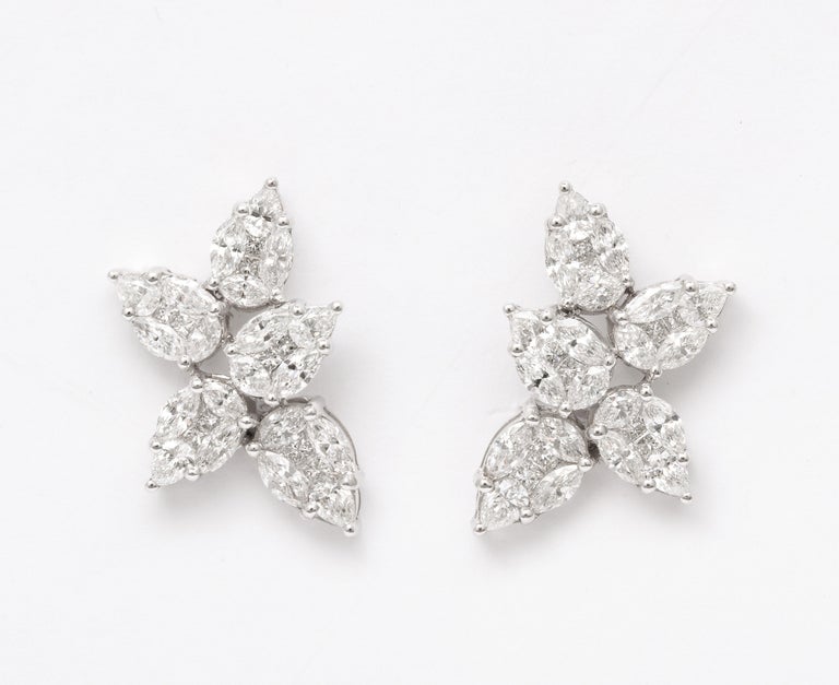https://a.1stdibscdn.com/cluster-diamond-earrings-for-sale-picture-5/j_415/j_144397721641928867867/6R1A8458_master.jpg?width=768