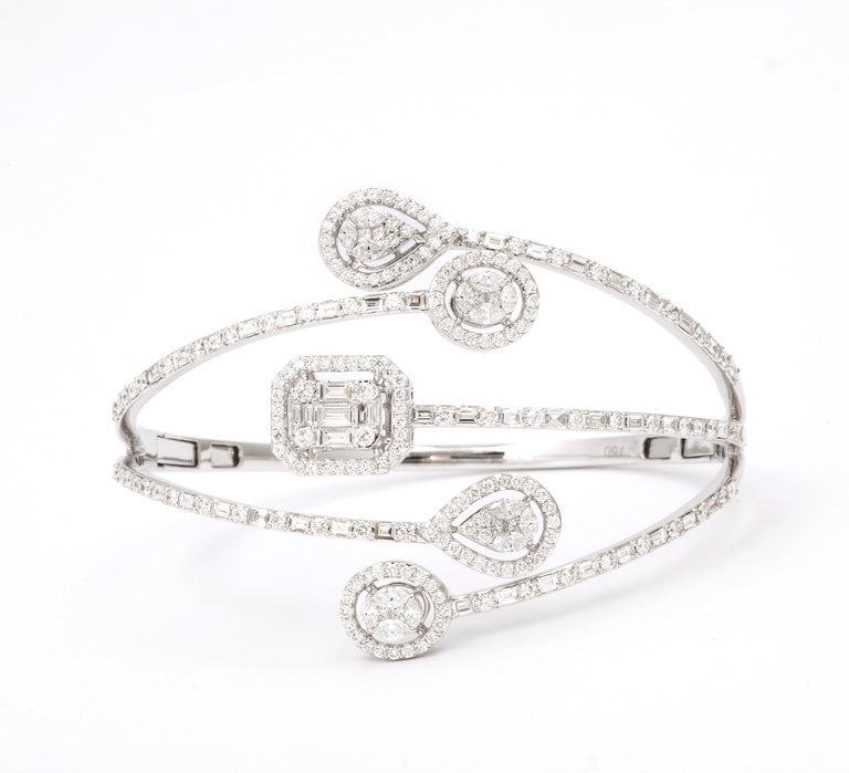 https://a.1stdibscdn.com/multi-shape-diamond-bangle-bracelet-for-sale-picture-7/j_415/j_143753121641493902104/6R1A8497_master.jpg?width=768