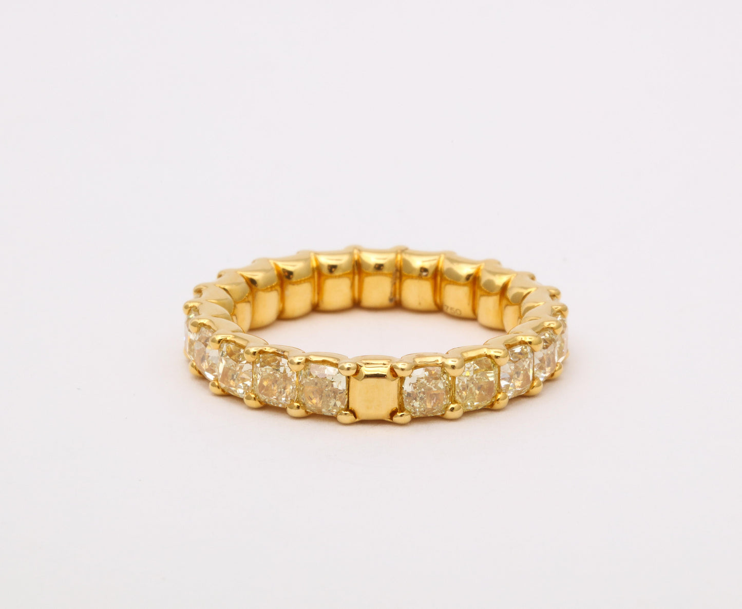 https://a.1stdibscdn.com/yellow-diamond-eternity-band-for-sale-picture-4/j_415/j_202927821694025263919/6R1A8672_master.jpg