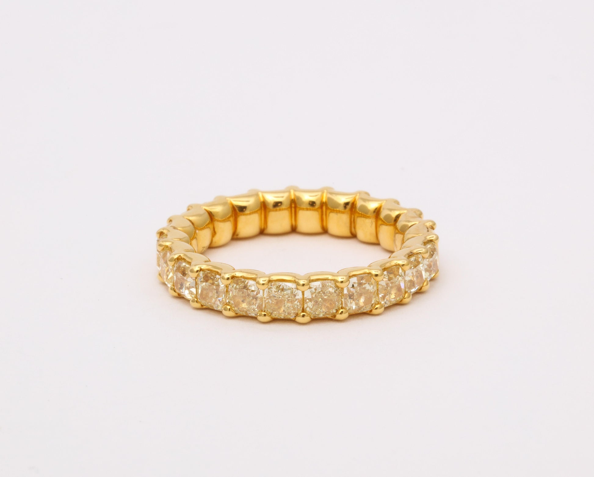 https://a.1stdibscdn.com/yellow-diamond-eternity-band-for-sale-picture-5/j_415/j_202927821694025263917/6R1A8673_master.jpg
