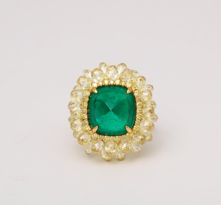 https://a.1stdibscdn.com/5-carat-sugarloaf-cabochon-emerald-and-yellow-diamond-ring-for-sale-picture-3/j_415/j_202926121694024693697/6R1A8711_master.jpg?width=768