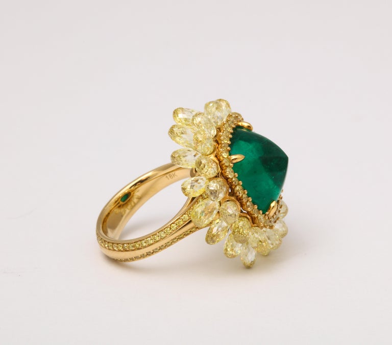 https://a.1stdibscdn.com/5-carat-sugarloaf-cabochon-emerald-and-yellow-diamond-ring-for-sale-picture-5/j_415/j_202926121694024693866/6R1A8713_master.jpg?width=768
