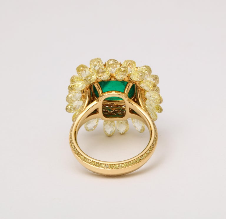 https://a.1stdibscdn.com/5-carat-sugarloaf-cabochon-emerald-and-yellow-diamond-ring-for-sale-picture-6/j_415/j_202926121694024693866/6R1A8714_master.jpg?width=768