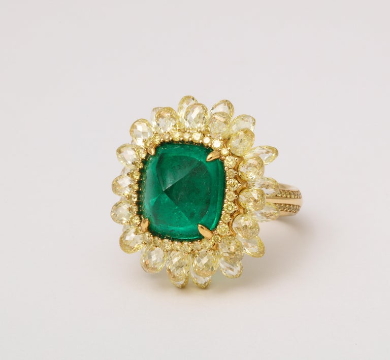 https://a.1stdibscdn.com/5-carat-sugarloaf-cabochon-emerald-and-yellow-diamond-ring-for-sale-picture-8/j_415/j_202926121694024696604/6R1A8716_master.jpg?width=768
