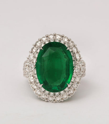 https://a.1stdibscdn.com/9-carat-vivid-green-emerald-and-diamond-ring-for-sale-picture-3/j_415/j_202926821694024997471/6R1A8720_master.jpg?width=768