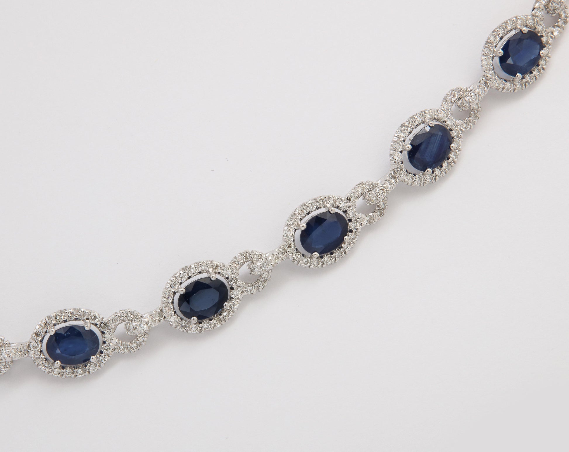 https://a.1stdibscdn.com/sapphire-and-diamond-necklace-for-sale-picture-5/j_415/j_203672721694713990254/6R1A8757_master.jpg